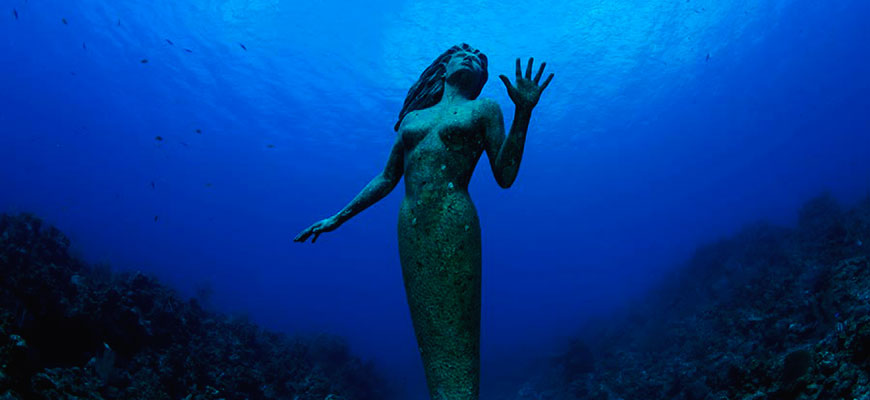 интересные подводные достопримечательности мира Статуя Амфитриты Каймановы острова Гранд Кайман