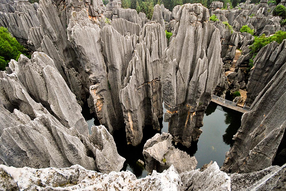 странные удивительные места Каменный лес Шилинь Shilin Китай